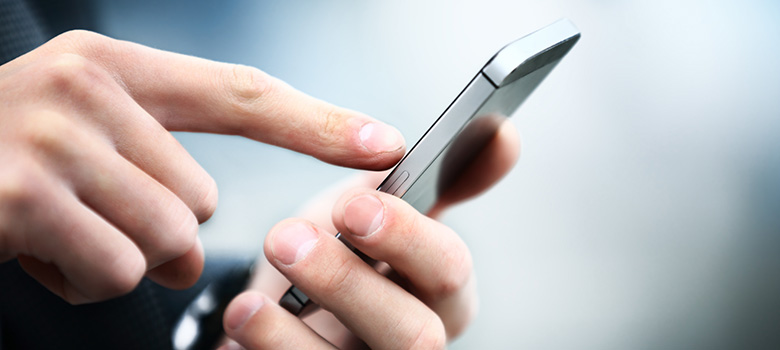 Microsoft Power Apps Smartphone user uses Power Apps